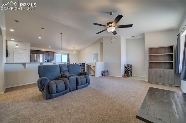 living room featuring light carpet, vaulted ceiling, and ceiling fan