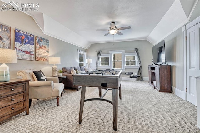 recreation room featuring ceiling fan, light colored carpet, and lofted ceiling