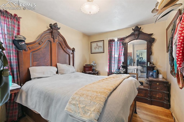 bedroom with light wood-type flooring