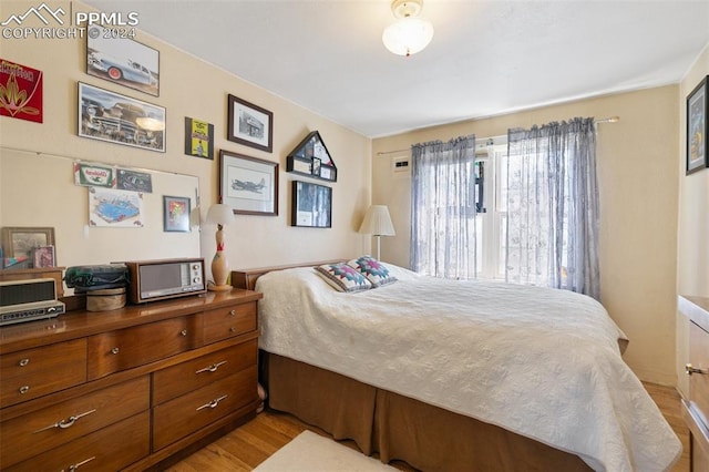 bedroom featuring light wood-type flooring