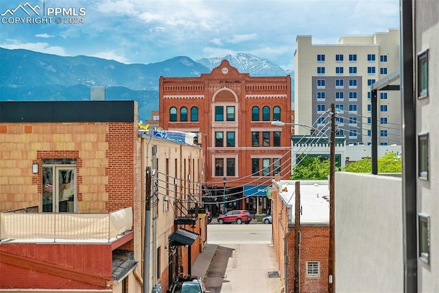 view of building exterior with a mountain view