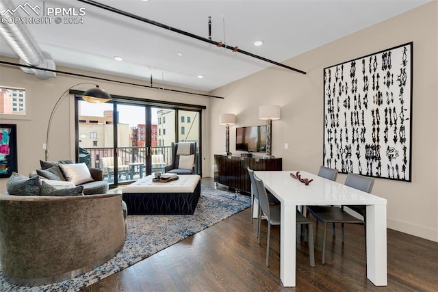 living room featuring dark wood-type flooring