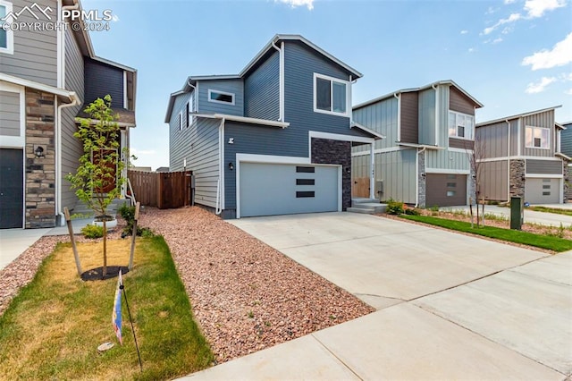 view of front of property with a garage