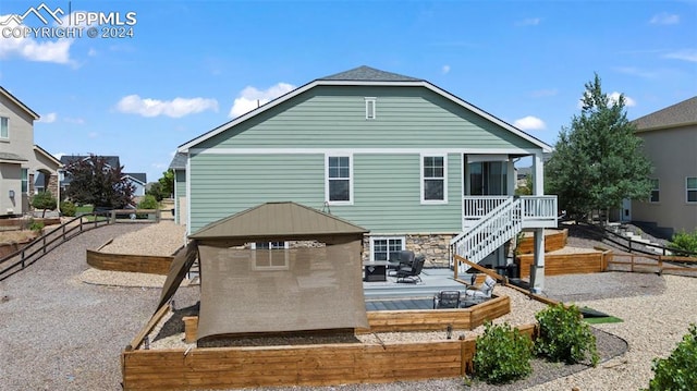 rear view of property with a patio