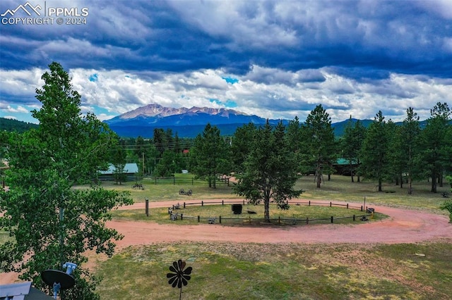 property view of mountains featuring a rural view