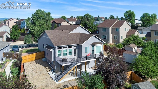 back of house with a garage