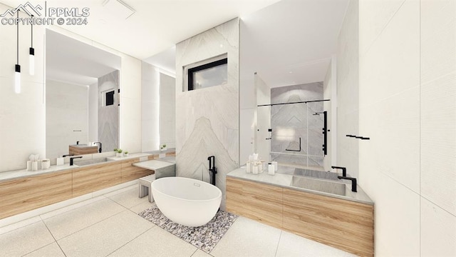 bathroom with tile patterned floors, vanity, tile walls, and shower with separate bathtub