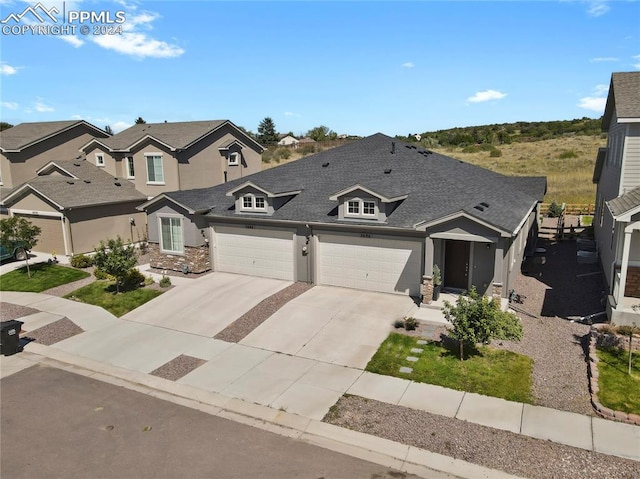 view of front of home with a garage