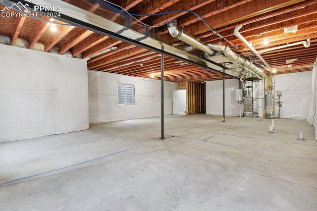 basement featuring gas water heater