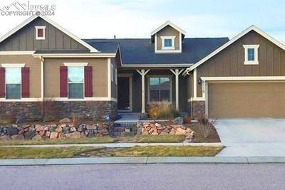 craftsman inspired home featuring a garage