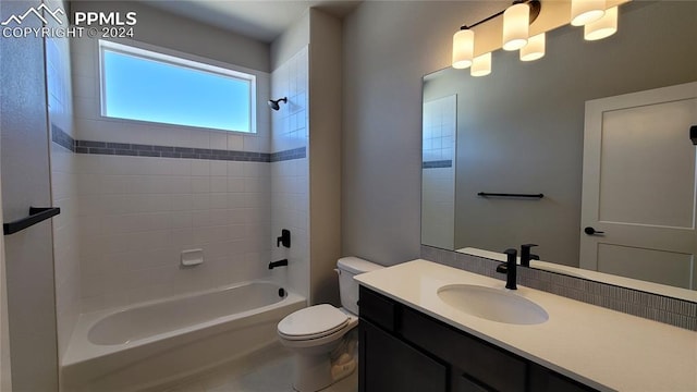 full bathroom with vanity, toilet, and shower / washtub combination