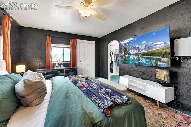 bedroom featuring carpet and ceiling fan