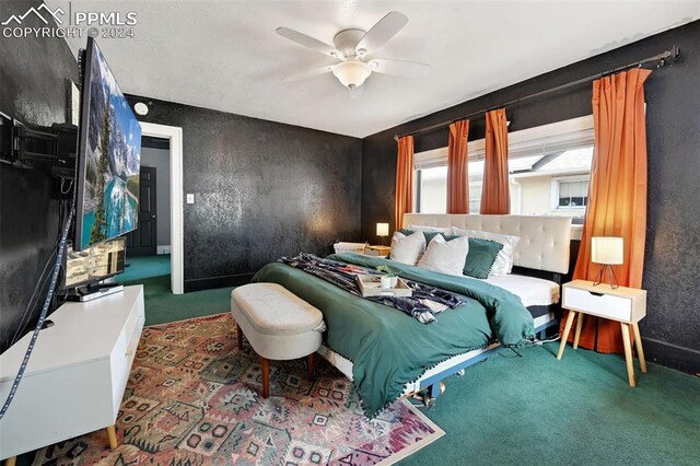 carpeted bedroom with ceiling fan