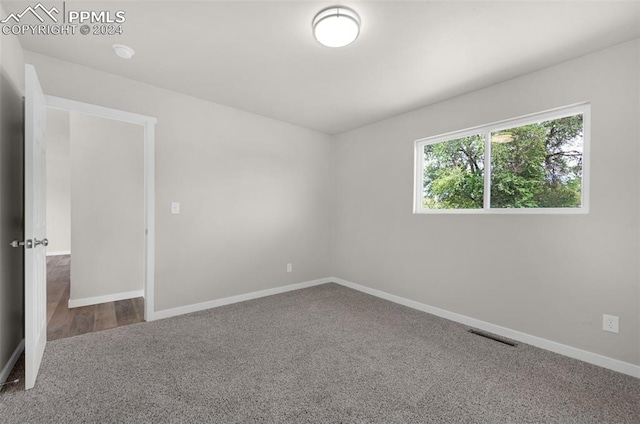 view of carpeted spare room