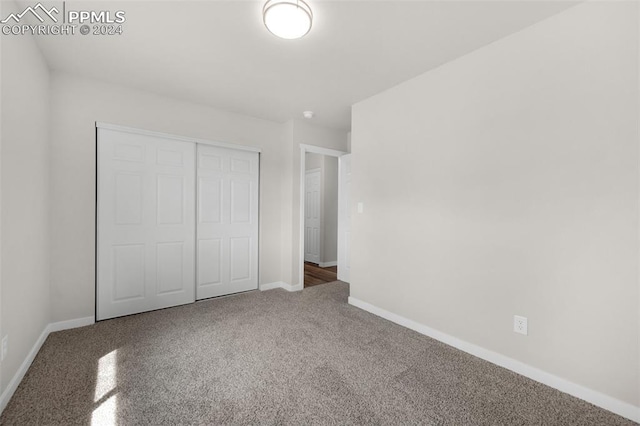 unfurnished bedroom featuring a closet