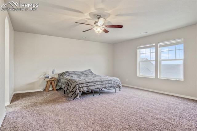 bedroom with carpet flooring and ceiling fan