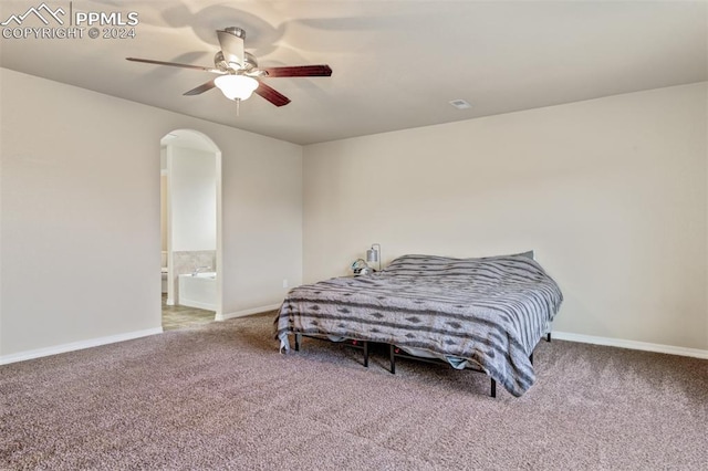 bedroom with ceiling fan and carpet floors