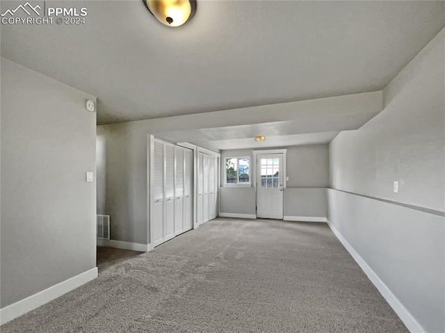 view of carpeted spare room