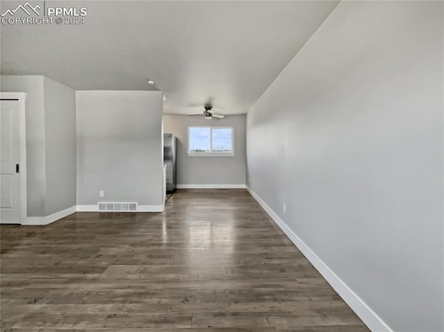 interior space featuring dark hardwood / wood-style floors and ceiling fan