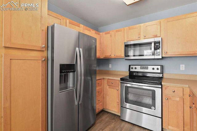 kitchen with dark hardwood / wood-style flooring, light brown cabinetry, and appliances with stainless steel finishes