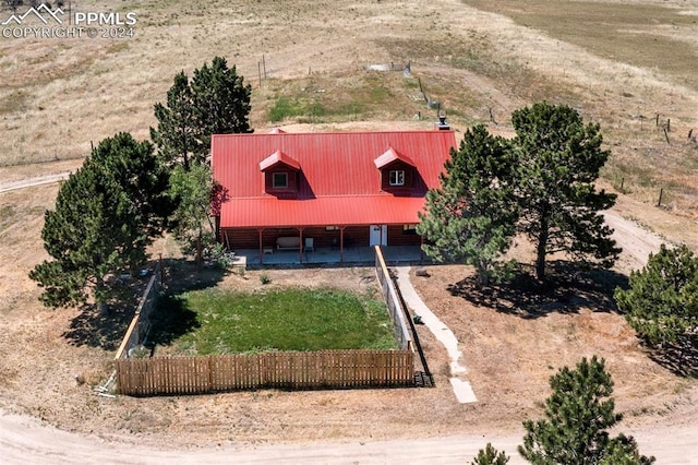 birds eye view of property featuring a rural view