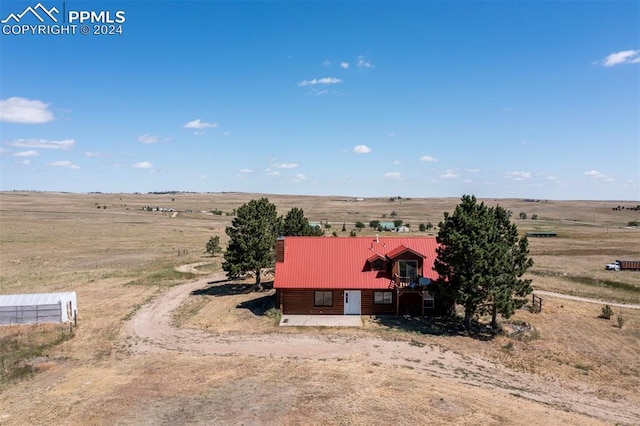 birds eye view of property featuring a rural view