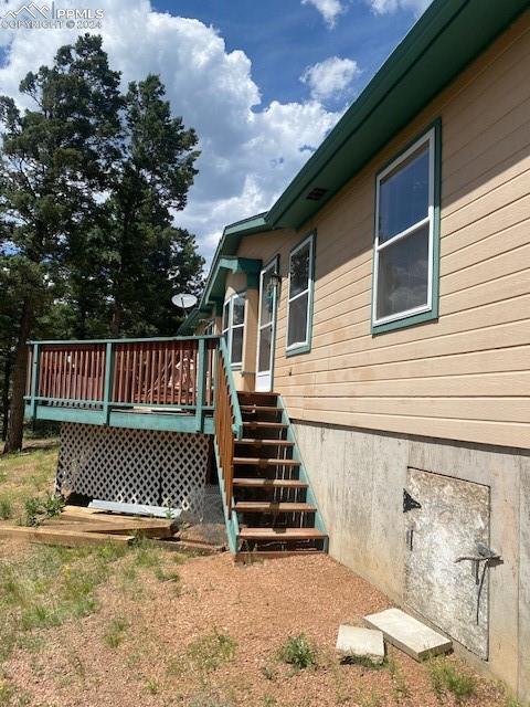 exterior space featuring a wooden deck