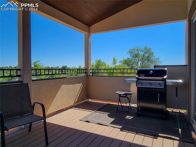 wooden terrace with grilling area