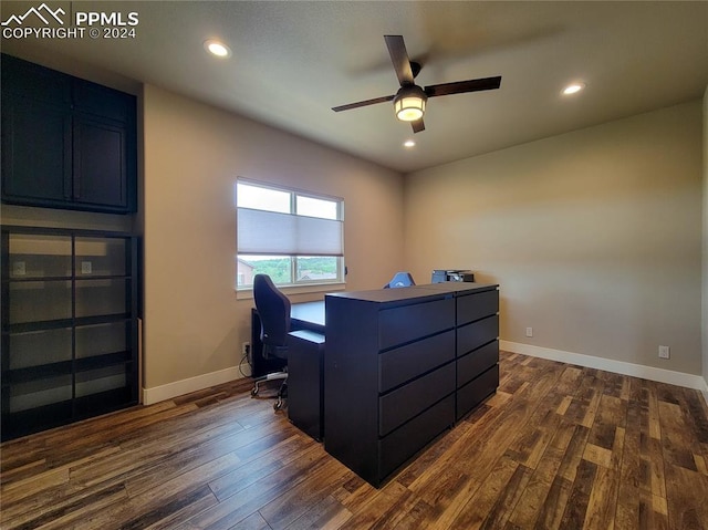 office space with ceiling fan and dark hardwood / wood-style flooring