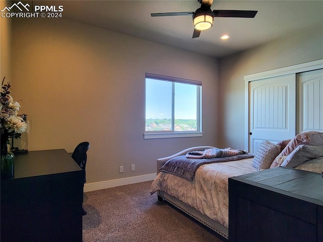 bedroom with carpet floors, a closet, and ceiling fan