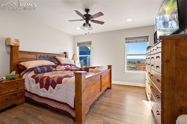 bedroom featuring ceiling fan and light wood-type flooring