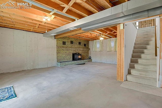 basement featuring a wood stove