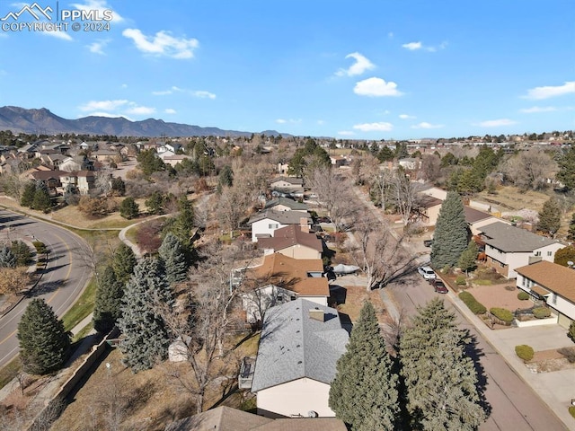 drone / aerial view featuring a mountain view