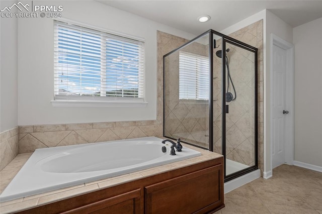 bathroom with independent shower and bath