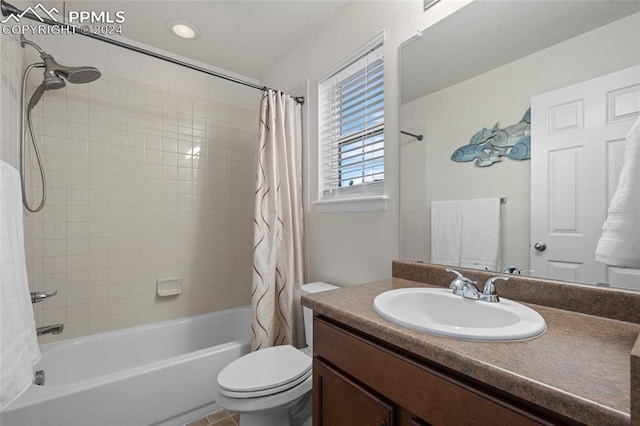 full bathroom with toilet, vanity, and shower / bath combination with curtain