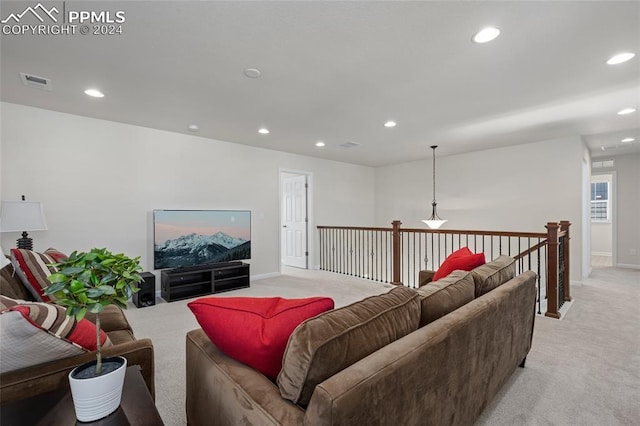 living room featuring light colored carpet