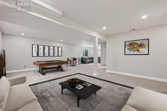 living room featuring light colored carpet and pool table