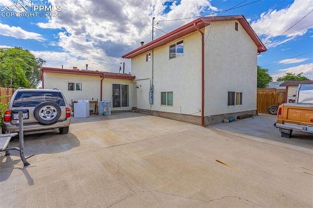 rear view of house featuring a patio area