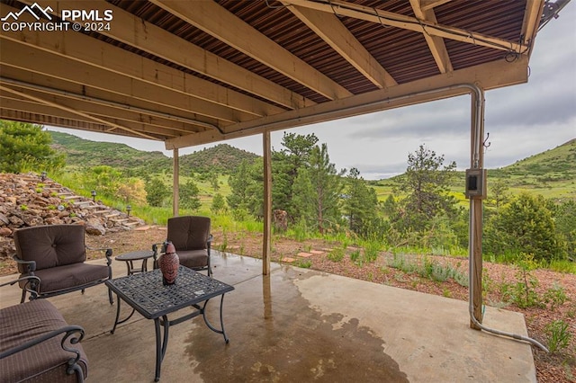 view of patio featuring a mountain view