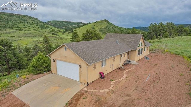 exterior space with a mountain view