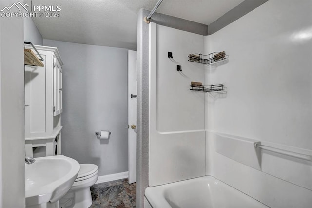 full bathroom featuring toilet, shower / tub combination, and sink