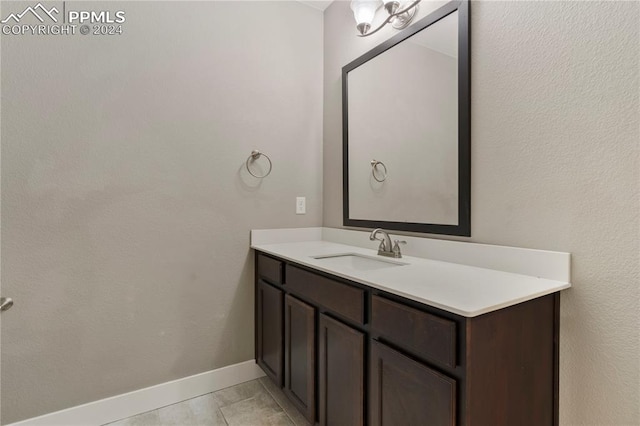 bathroom with vanity and tile patterned floors