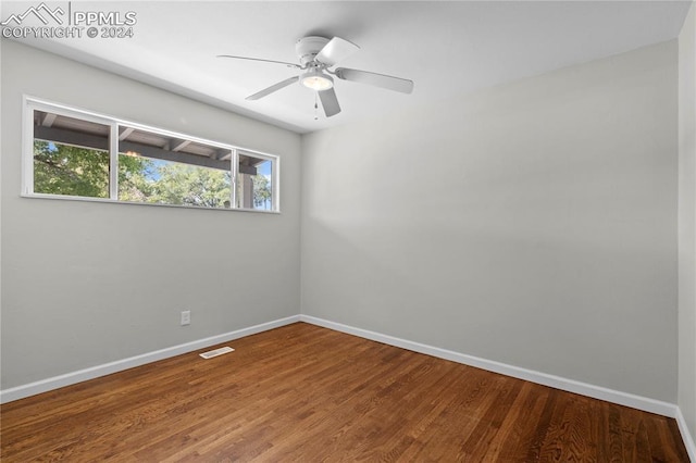 unfurnished room featuring ceiling fan and wood-type flooring