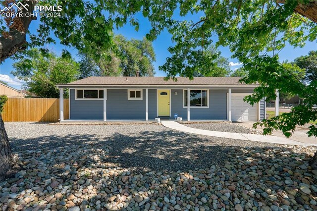 ranch-style home with a garage