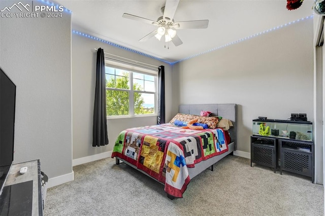 bedroom featuring carpet floors and ceiling fan