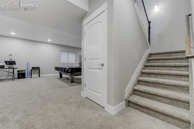 stairs featuring carpet and billiards