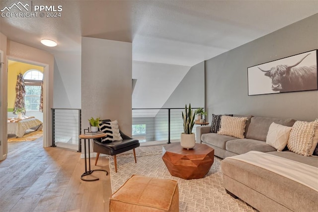 living room with light hardwood / wood-style flooring