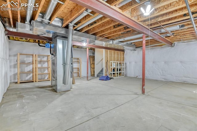 basement featuring heating unit