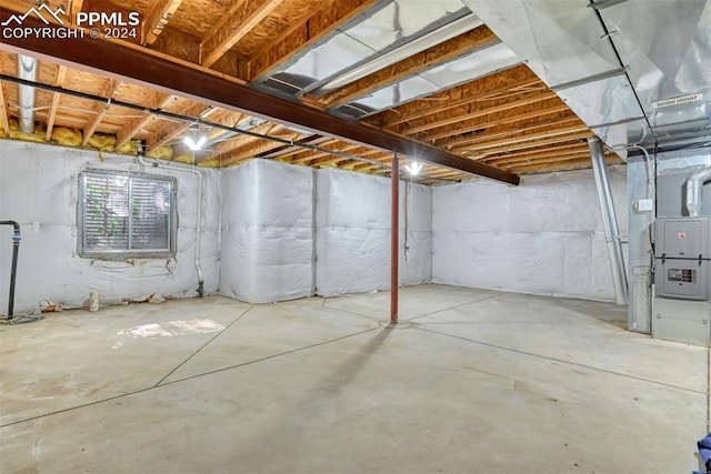 basement featuring heating unit