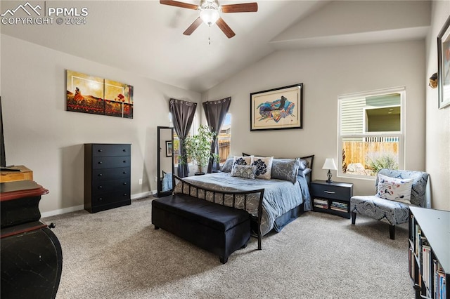 carpeted bedroom featuring ceiling fan and vaulted ceiling